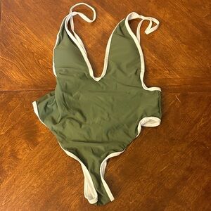 Green and white low cut cheeky bathing suit
